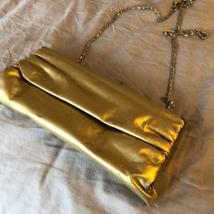 Gold pleated envelope clutch